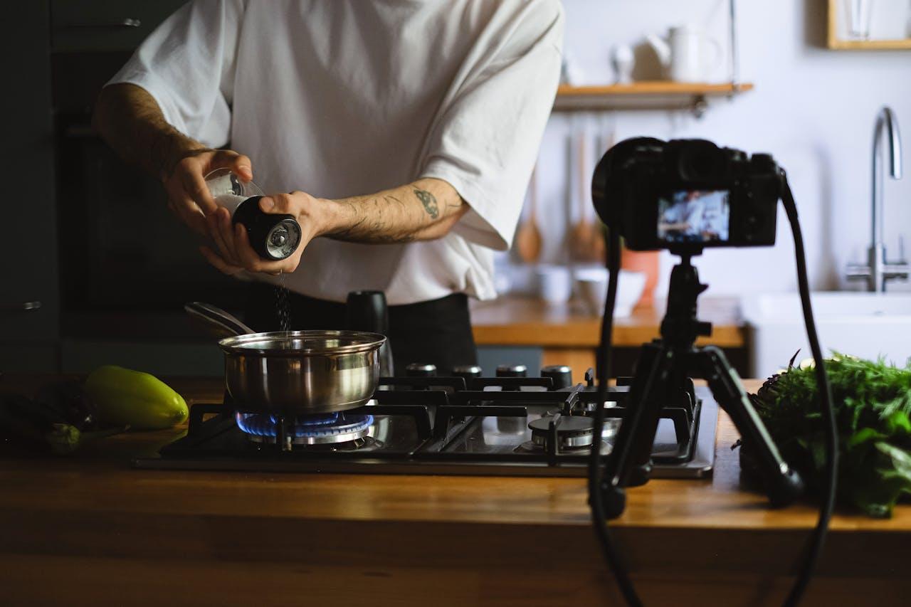 Cook recording a video that he will later transcribe to create more content faster